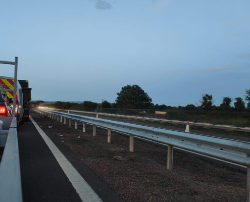 New roadside safety barrier installed during evening trunk road upgrade works