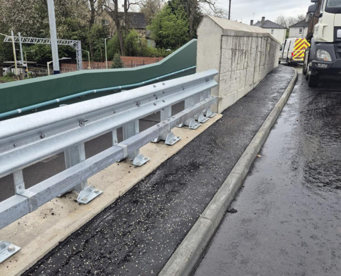 New vehicle restraint system installed beside bridge parapet for BAM in Perth